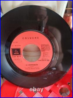 AUTOGRAPHE de COLUCHE SUR Disque 45 Tours Le Schmilblick
